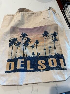 Del Sol Color Changing Canvas Tote Bag - Cream with Navy and Sunset Print.